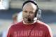 STANFORD, CA - NOVEMBER 30: Stanford Cardinal head coach David Shaw holds up a rose after the Cardinal beat the UCLA Bruins 27-24 in the Pac-12 Championship game at Stanford Stadium on November 30, 2012 in Stanford, California. (Photo by Ezra Shaw/Getty Images)