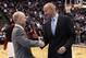 Dec 19, 2012; Cincinnati, OH, USA; Xavier Musketeers head coach Chris Mack (right) and Cincinnati Bearcats head coach Mick Cronin (left) shake hands prior to the game at U.S. Bank Arena. Mandatory Credit: Frank Victores-USA TODAY Sports