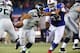 TORONTO, ON - DECEMBER 16: Russell Wilson #3 of the Seattle Seahawks is flushed out of the pocket during an NFL game by Alex Carrington #92 of the Buffalo Bills at Rogers Centre on December 16, 2012 in Toronto, Ontario, Canada. (Photo by Tom Szczerbowski/Getty Images)