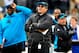 CHARLOTTE, NC - NOVEMBER 18: Coach Ron Rivera of the Carolina Panthers watches the replay board after his team was called for a late hit personal foul late in the fourth quarter against the Tampa Bay Buccaneers at Bank of America Stadium on November 18, 2012 in Charlotte, North Carolina. Tampa Bay won 27-21 in overtime. (Photo by Grant Halverson/Getty Images)