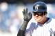 NEW YORK, NY - SEPTEMBER 19: Nick Swisher #33 of the New York Yankees reacts after connecting on an RBI single in the ninth inning against the Toronto Blue Jays during the first game of a double header at Yankee Stadium on September 19, 2012 in the Bronx borough of New York City. (Photo by Jason Szenes/Getty Images)
