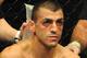 GOLD COAST, AUSTRALIA - DECEMBER 15: George Sotiropoulos looks dejected after the Lightweight bout between George Sotiropoulos and Ross Pearson at Gold Coast Convention and Exhibition Centre on December 15, 2012 on the Gold Coast, Australia. (Photo by Matt Roberts/Getty Images)