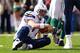 EAST RUTHERFORD, NJ - OCTOBER 23: Philip Rivers #17 of the San Diego Chargers gets up from the ground after being sacked against the New York Jets at MetLife Stadium on October 23, 2011 in East Rutherford, New Jersey. (Photo by Nick Laham/Getty Images)
