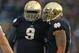 SOUTH BEND, IN - OCTOBER 20: Louis Nix III #9 of the Notre Dame Fighting Irish talks with Manti T'eo #5 before the start of play against the BYU Cougars at Notre Dame Stadium on October 20, 2012 in South Bend, Indiana. Notre Dame defeated BYU 17-14. (Photo by Jonathan Daniel/Getty Images)