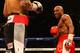 LAS VEGAS, NV - MAY 05: Floyd Mayweather Jr. looks over at Miguel Cotto during their WBA super welterweight title fight at the MGM Grand Garden Arena on May 5, 2012 in Las Vegas, Nevada. (Photo by Al Bello/Getty Images)