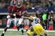 ARLINGTON, TX - SEPTEMBER 01: T.J. Yeldon #4 of the Alabama Crimson Tide runs the ball against Jake Ryan #90 of the Michigan Wolverines at Cowboys Stadium on September 1, 2012 in Arlington, Texas. (Photo by Ronald Martinez/Getty Images)