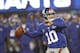EAST RUTHERFORD, NJ - DECEMBER 09: Eli Manning #10 of the New York Giants looks to pass against the New Orleans Saints during their game at MetLife Stadium on December 9, 2012 in East Rutherford, New Jersey. (Photo by Jeff Zelevansky/Getty Images)