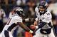BALTIMORE, MD - DECEMBER 16: Quarterback Peyton Manning #18 of the Denver Broncos hands the ball off to running back Ronnie Hillman #21 during the second half against the Baltimore Ravens at M&T Bank Stadium on December 16, 2012 in Baltimore, Maryland. (Photo by Rob Carr/Getty Images)
