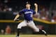 PHOENIX, AZ - OCTOBER 03: Starting pitcher Jeff Francis #26 of the Colorado Rockies pitches against the Arizona Diamondbacks during the MLB game at Chase Field on October 3, 2012 in Phoenix, Arizona. (Photo by Christian Petersen/Getty Images)