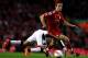 LIVERPOOL, ENGLAND - MAY 01: Clint Dempsey of Fulham is beaten to the ball by Jordan Henderson of Liverpool during the Barclays Premier League match between Liverpool and Fulham at Anfield on May 1, 2012 in Liverpool, England. (Photo by Clive Brunskill/Getty Images)