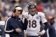 BALTIMORE, MD - DECEMBER 16: Quarterback Peyton Manning #18 of the Denver Broncos talks with offensive Coordinator Mike McCoy during the second half against the Baltimore Ravens at M&T Bank Stadium on December 16, 2012 in Baltimore, Maryland. (Photo by Rob Carr/Getty Images)