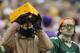 GREEN BAY, WI - DECEMBER 2: Fans of the Green Bay Packers watch the game against the Minnesota Vikings at Lambeau Field on December 2, 2012 in Green Bay, Wisconsin. The Packers defeated the Vikings 23-14. (Photo by Wesley Hitt/Getty Images)