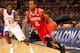 ST. LOUIS, MO - MARCH 23: Lorenzo Brown #2 of the North Carolina State Wolfpack drives against Elijah Johnson #15 of the Kansas Jayhawks during the 2012 NCAA Men's Basketball Midwest Regional Semifinal at Edward Jones Dome on March 23, 2012 in St. Louis, Missouri. (Photo by Dilip Vishwanat/Getty Images)