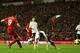 LIVERPOOL, ENGLAND - DECEMBER 22: Stewart Downing of Liverpool scores his team's third goal during the Barclays Premier League match between Liverpool and Fulham at Anfield on December 22, 2012 in Liverpool, England. (Photo by Clive Brunskill/Getty Images)