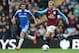 BIRMINGHAM, ENGLAND - MARCH 31: Barry Bannan of Aston Villa takes the ball past Juan Mata of Chelsea during the Barclays Premier League match between Aston Villa and Chelsea at Villa Park on March 31, 2012 in Birmingham, England. (Photo by Mike Hewitt/Getty Images)