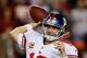 LANDOVER, MD - DECEMBER 03: Quarterback Eli Manning #10 of the New York Giants throws the ball in the third quarter against the Washington Redskins at FedExField on December 3, 2012 in Landover, Maryland. (Photo by Rob Carr/Getty Images)