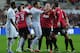 SWANSEA, WALES - DECEMBER 23: Robin Van Persie of Manchester United is pulled away from Ashley Williams of Swansea City during the Barclays Premier League match between Swansea City and Manchester United at the Liberty Stadium on December 23, 2012 in Swansea, Wales. (Photo by Jamie McDonald/Getty Images)