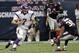 HOUSTON, TX - DECEMBER 23: Christian Ponder #7 of the Minnesota Vikings rushes as Danieal Manning #38 of the Houston Texans looks to make the tackle at Reliant Stadium on December 23, 2012 in Houston, Texas. (Photo by Bob Levey/Getty Images)