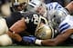 ARLINGTON, TX - DECEMBER 23: Tight end Jimmy Graham #80 of the New Orleans Saints recovers a fumble against strong safety Eric Frampton #27 of the Dallas Cowboys and inside linebacker Dan Connor #52 of the Dallas Cowboys at Cowboys Stadium on December 23, 2012 in Arlington, Texas. The New Orleans Saints went on the kick the game winning field goal against the Dallas Cowboys in overtime. (Photo by Tom Pennington/Getty Images)