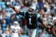 CHARLOTTE, NC - DECEMBER 23: Cam Newton #1 of the Carolina Panthers celebrates after throwing a touchdown pass to teammate Steve Smith #89 during their game against the Oakland Raiders at Bank of America Stadium on December 23, 2012 in Charlotte, North Carolina. (Photo by Streeter Lecka/Getty Images)