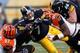 PITTSBURGH, PA - DECEMBER 23: Ben Roethlisberger #7 of the Pittsburgh Steelers is tackled during the fourth quarter by Geno Atkins #97 and Carlos Dunlap #96 of the Cincinnati Bengals at Heinz Field on December 23, 2012 in Pittsburgh, Pennsylvania. Cincinnati won the game 13-10. (Photo by Gregory Shamus/Getty Images)