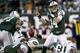EAST RUTHERFORD, NJ - DECEMBER 23: Greg McElroy #14 of the New York Jets loses the ball in front of Kendall Reyes #91 of the San Diego Chargers at MetLife Stadium on December 23, 2012 in East Rutherford, New Jersey. (Photo by Jeff Zelevansky /Getty Images)