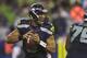 SEATTLE, WA - DECEMBER 23: Russell Wilson #3 of the Seattle Seahawks drops back to pass during a game against the San Francisco 49ers at CenturyLink Field on December 23, 2012 in Seattle, Washington. (Photo by Stephen Brashear/Getty Images)