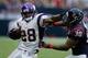 HOUSTON, TX - DECEMBER 23: Adrian Peterson #28 of the Minnesota Vikings runs upfield against Daniel Manning #38 of the Houston Texans at Reliant Stadium on December 23, 2012 in Houston, Texas. (Photo by Scott Halleran/Getty Images)