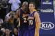 December 22, 2012; Oakland, CA, USA; Los Angeles Lakers shooting guard Kobe Bryant (24, left) and point guard Steve Nash (10) celebrate after the game against the Golden State Warriors at ORACLE Arena. The Lakers defeated the Warriors 118-115 in overtime. Mandatory Credit: Kyle Terada-USA TODAY Sports