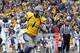 MORGANTOWN, WV - NOVEMBER 03: Tavon Austin #1 of the West Virginia Mountaineers catches a forty three yard touchdown pass against the TCU Horned Frogs during the game on November 3, 2012 at Mountaineer Field in Morgantown, West Virginia. (Photo by Justin K. Aller/Getty Images)
