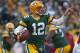 Packers quarterback Aaron Rodgers rolled for 342 yards passing and four touchdowns (one rushing) in his team's 55-7 rout of the hapless Titans.