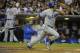 SAN DIEGO, CA - SEPTEMBER 25: Andre Ethier #16 of the Los Angeles Dodgers hits a single during the third inning of a baseball game against the San Diego Padres at Petco Park on September 25, 2012 in San Diego, California. (Photo by Denis Poroy/Getty Images)