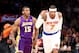 Dec. 13, 2012; New York, NY, USA; New York Knicks small forward Carmelo Anthony (7) gestures on the court as Los Angeles Lakers small forward Metta World Peace (15) follows during the first half at Madison Square Garden. Mandatory Credit: Debby Wong-USA TODAY Sports