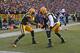 GREEN BAY, WI - DECEMBER 23: Randall Cobb #18 of the Green Bay Packers (L) celebrates a touchdown catch with Greg Jennings #85 against the Tennessee Titans at Lambeau Field on December 23, 2012 in Green Bay, Wisconsin. The Packers defeated the Titans 55-7. (Photo by Jonathan Daniel/Getty Images)