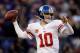 BALTIMORE, MD - DECEMBER 23: Quarterback Eli Manning #10 of the New York Giants throws a first half pass against the Baltimore Ravens at M&T Bank Stadium on December 23, 2012 in Baltimore, Maryland. (Photo by Rob Carr/Getty Images)