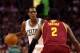 Dec 19, 2012; Boston, MA, USA; Boston Celtics point guard Rajon Rondo (left) dribbles the ball against Cleveland Cavaliers point guard Kyrie Irving (2) during the second half at TD Garden. Mandatory Credit: Mark L. Baer-USA TODAY Sports