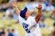 LOS ANGELES, CA - AUGUST 20: WWE Superstar John Cena throws the ceremonial first pitch for the Los Angeles Dodgers as they play the Chicago Cubs on August 20, 2009 at Dodger Stadium in Los Angeles, California. (Photo by Jacob de Golish/Getty Images)