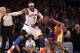 NEW YORK, NY - DECEMBER 13: Kobe Bryant #24 of the Los Angeles Lakers plays against Carmelo Anthony #7 of the New York Knicks at Madison Square Garden on December 13, 2012 in New York City. NOTE TO USER: User expressly acknowledges and agrees that, by downloading and/or using this photograph, user is consenting to the terms and conditions of the Getty Images License Agreement. The Knicks defeated the Lakers 116-107. (Photo by Bruce Bennett/Getty Images)