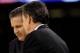 John Calipari and Rick Pitino share a handshake