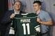 ST PAUL, MN - JULY 9: Craig Leipold, owner of the Minnesota Wild poses for pictures with Zach Parise #11 during a press conference on July 9, 2012 at Xcel Energy Center in St Paul, Minnesota. (Photo by Hannah Foslien/Getty Images)