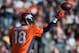 DENVER, CO - DECEMBER 23: Quarterback Peyton Manning #18 of the Denver Broncos passes against the Cleveland Browns during a game at Sports Authority Field at Mile High on December 23, 2012 in Denver, Colorado. The Broncos defeated the Browns 34-12. (Photo by Dustin Bradford/Getty Images)
