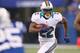 INDIANAPOLIS, IN - NOVEMBER 04: Reggie Bush #22 of the Miami Dolphins looks for running room while playing the Indianapolis Colts at Lucas Oil Stadium on November 4, 2012 in Indianapolis, Indiana. (Photo by Gregory Shamus/Getty Images)