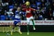 READING, ENGLAND - DECEMBER 26: Kyle Bartley of Swansea City is challenged by Reading Captain Jobi McAnuff during the Barclays Premier League match between Reading and Swansea City at Madejski Stadium on December 26, 2012 in Reading, England. (Photo by Warren Little/Getty Images)