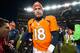 DENVER, CO - DECEMBER 23: Quarterback Peyton Manning #18 of the Denver Broncos walks out to shake hands with members of the Cleveland Browns after a game at Sports Authority Field at Mile High on December 23, 2012 in Denver, Colorado. The Broncos defeated the Browns 34-12. (Photo by Dustin Bradford/Getty Images)