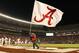 Oct 22, 2011; Tuscaloosa, AL, USA; Alabama Crimson Tide mascot Big Al carries a flag after a touchdown against the Tennessee Volunteers at Bryant Denny Stadium. Mandatory Credit: Marvin Gentry-USA TODAY Sports