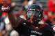 CINCINNATI, OH - DECEMBER 03: Walter Stewart #54 of the Cincinnati Bearcats celebrates after scoring a touchdown from a fumble recovery against the Connecticut Huskies on December 3, 2011 at Nippert Stadium in Cincinnati, Ohio. Cincinnati defeated Connecticut 35-27. (Photo by Tyler Barrick/Getty Images)