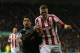 STOKE-ON-TRENT, ENGLAND - DECEMBER 26: Luis Suarez of Liverpool tussles for posession with Robert Huth of Stoke City during the Barclays Premier League match between Stoke City and Liverpool at the Britannia Stadium on December 26, 2012, in Stoke-on-Trent, England. (Photo by Bryn Lennon/Getty Images)