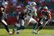 MIAMI GARDENS, FL - DECEMBER 02: Brian Hartline #82 of the Miami Dolphins rushes after a catch during a game against the New England Patriots at Sun Life Stadium on December 2, 2012 in Miami Gardens, Florida. (Photo by Mike Ehrmann/Getty Images)
