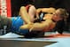August 18, 2012; San Diego, CA, USA; Sarah Kaufman (blue shirt) and Ronda Rousey (black shirt) during their Strikeforce MMA women's bantamweight title bout at the Valley View Casino Center. Rousey won in 54 seconds of the first round. Mandatory Credit: Jayne Kamin-Oncea-USA TODAY Sports