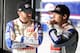CONCORD, NC - DECEMBER 11: Dale Earnhardt Jr. (L), driver of the #88 National Guard Chevrolet, speaks with Regan Smith, driver of the Hendrick Motorsports Chevrolet, in the garage area during testing at Charlotte Motor Speedway on December 11, 2012 in Concord, North Carolina. (Photo by Jared C. Tilton/Getty Images for NASCAR)